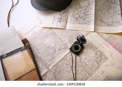 Udine, Italia. February 03, 2021. Topographic Map Of The German Army Of The Second World War. Card Holder, Compass And German Helmet