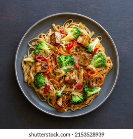 Udon Noodles With Tofu, Broccoli, Carrots, Pepper And Sesame. Healthy Eating. Vegetarian Food. Asian Food