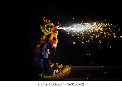 UDONTHANI THAILAND, DragonJanuary 2017 :Dragon dance show with firework in the festival of 2017 Chinese New Year in the night at San Jao Pu Ya Udonthani ,Thailand