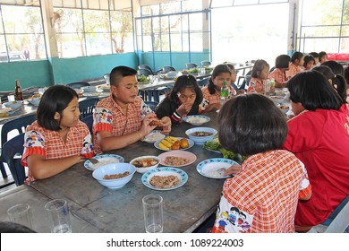 UDONTHANI, THAILAND – JANUARY 18, 2018:  Lunch time,  students are happy and smiling in lunch time at their school.  - Shutterstock ID 1089224003
