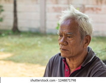 Udonthani/Thailand-October 06 2018; An Asian Oldman Sitting Alone With Sad Expression.