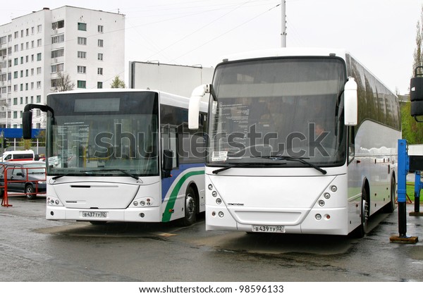UFA, RUSSIA - MAY 11: Coach NEFAZ 52999 (VDL
Mistral) and city bus NEFAZ 52998 (VDL Transit) exhibited at the
annual Motor show 