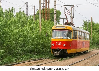 Ufa, Russia - May 14, 2008: Red And Yellow Urban Tram Tatra T3 In A City Street.