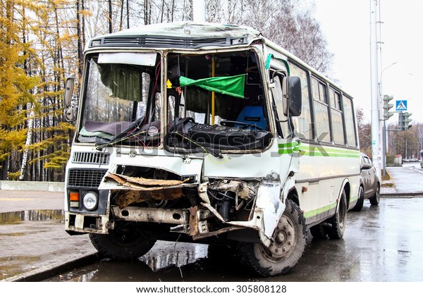 UFA, RUSSIA - NOVEMBER 4, 2011: Crashed city bus\
PAZ 3205 at the bus stop.
