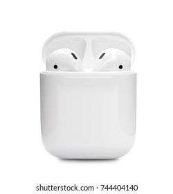 UFA, RUSSIA - OCTOBER 20, 2017: AirPods wireless bluetooth headphones developed by Apple Inc. Apple Airpods in open box.