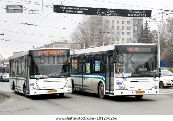 UFA, RUSSIA -\
OCTOBER 31, 2010: White VDL NEFAZ 52997 city buses of the\
Bashavtotrans bus company at city\
street.