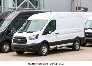 Ufa, Russia - September 16, 2021: Brand new white cargo van Ford Transit in a city street.