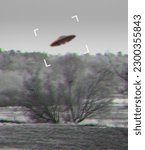 UFO, alien and camcorder on a camera screen to record a flying saucer in the sky over area 51. Viewfinder, motion blur and conspiracy with a spaceship on a recording device display outdoor in nature