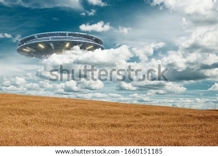 UFO, an alien plate hovering over the field, hovering motionless in the air. Unidentified flying object, alien invasion, extraterrestrial life, space travel, humanoid spaceship mixed medium