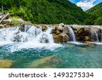 Ugar river with small water cascade near village Donji Orasac in Bosnia and Herzegovina