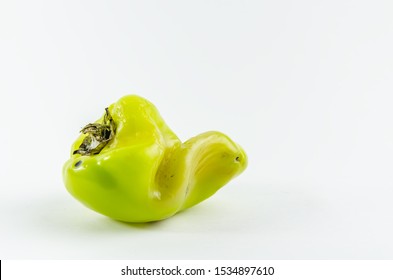 Ugly Food. Green Pepper On A White Background