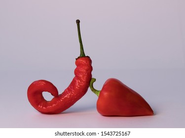 Ugly Red Hot Chili Peppers On A White Background