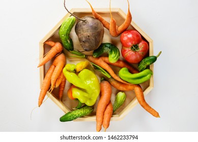 Ugly Vegetables On A Wooden Board. Ugly Food Concept, Flat Lay.