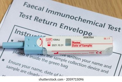 UK - April 21, 2021. Closeup Of FIT Test (faecal Immunochemical Test), A Fecal Occult Blood Test For Screening Bowel Cancer