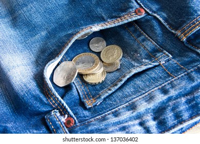 UK Coins Falling Out Of Jeans Pocket