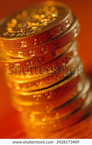 Uk currency, stack of one pound coins