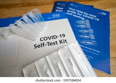 UK, February 2nd 2021 - Covid 19 Coronavirus Pandemic Close Up Government New Variant Full Home Test Kit From NHS National Health Self Testing Diagnosis With Swabs Instructions For Self Isolation