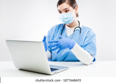 UK GP Doctor Chatting To Patient Over Computer,general Practitioner In Office Online Video Call During Coronavirus Lockdown,tele Visit Healthcare Concept,remote Tele Medicine COVID-19 Appointment 