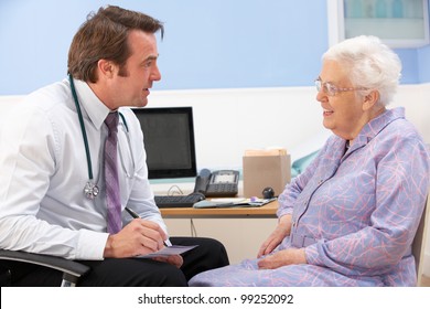 UK GP Talking To Senior Woman Patient