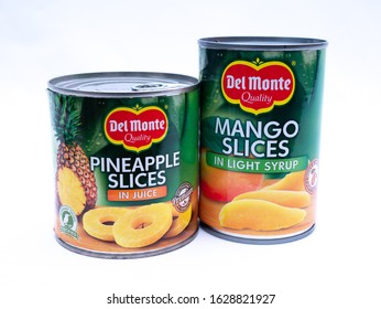 UK, Jan 2020: Del Monte Canned Fruit Pineapple And Mango On White Studio Background