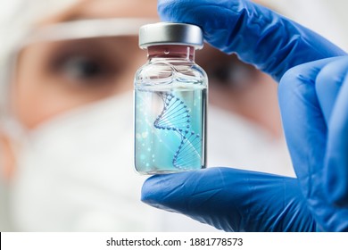 UK Lab Scientist Biotechnologist Holding Glass Ampoule Phial With DNA Strand,molecule Of Two Polynucleotide Chains Forming Double Helix Carrying Coronavirus Genetic Instruction,new Strain RNA Mutation
