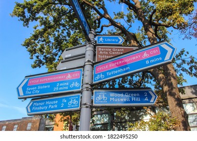 UK / London - 14 September 2020: Cycle superhighway and other directional signage, Tottenham Green, north London