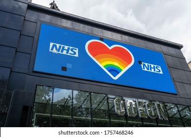 UK, London, 16/6/2020 - A Large NHS Electronic Billboard On The Side Of The Odeon Cinema In Leicester Square With A Statue Of Batman On The Roof