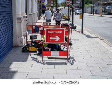 UK, London, 1/7/2020 - A BT Broadband Engineer Working On Communications Cables In London