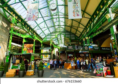 UK, London - April 08, 2015: Unidentified people visit Borough Market in London
