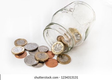 UK Money Falling From Jar