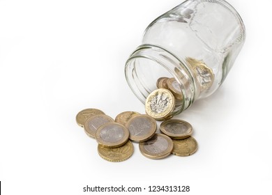 UK Money Falling From Jar, Changing Ito Euro Coins