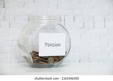 UK Money Jar On A White Shelf In A Household Living Room. Saving For Pension Concept