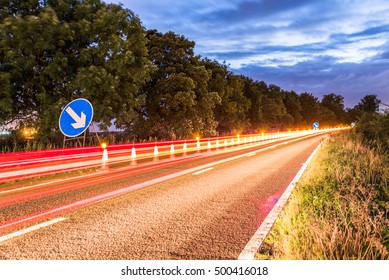 UK Motorway Roadworks Sign At Night