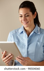 UK Nurse Using Computer Tablet