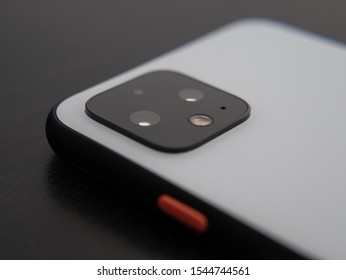 UK, October 2019: Pixel 4 White Smart Phone Close Up Camera Lens And Power Button