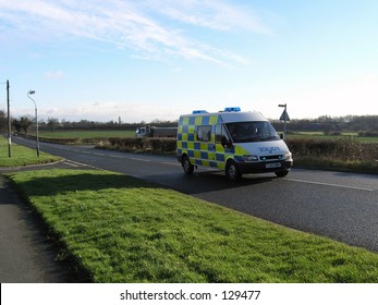 UK Police Vehicle With Flashing Blue Lights