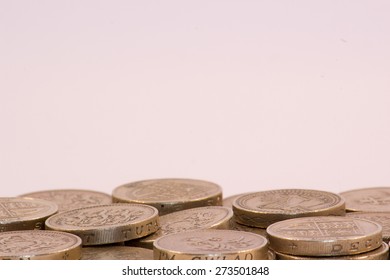 UK Pound Coins On White Background