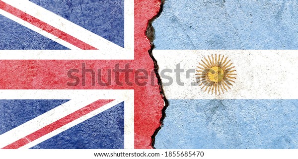 UK vs\
Argentina national flags icon isolated on weathered broken cracked\
concrete wall background, abstract international politics\
relationship conflicts concept texture\
wallpaper