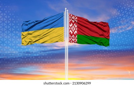 Ukraine And Belarus Two Flags On Flagpoles And Blue Sky

