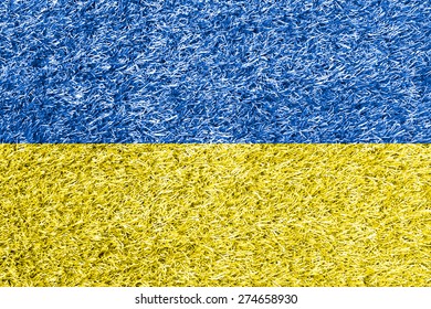 Ukraine flag on grass background texture