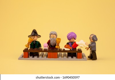 Ukraine, Kyiv - April 1, 2020: Lego Men And Figures From The Harry Potter Drink Tea, Dine, Eat. Lego Constructor And Its Details. Child Game. Place For Text. Isolated Plot. Holiday, Feast.Food At Home