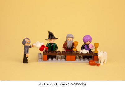 Ukraine, Kyiv - April 1, 2020: Lego Men And Figures From The Harry Potter Drink Tea, Dine, Eat. Lego Constructor And Its Details. Child Game. Place For Text. Isolated Plot. Holiday, Feast.Food At Home