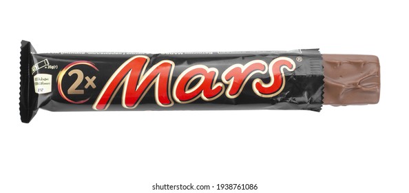 Ukraine, Kyiv - March 18, 2021: Close Up Of Unwrapped Mars Candy Chocolate Bar Made By Mars Inc. File Contains Clipping Path.