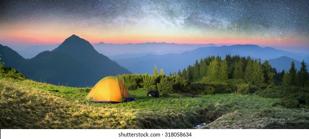  Ukraine - Marmarosh mountain when the snow melts and becomes warmer - in the spring  summer is pleasant to put up tents on the top of the mountain - it's fantastic fantastically beautiful  romantic - Shutterstock ID 318058634