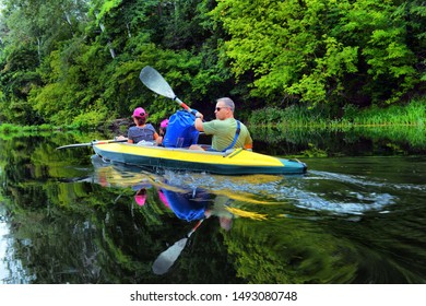 Ukraine, Psyol, 26,07,2019. Couple kayaking together in mangrove river.  Tourists kayakers touring the river of Islamorada. Ukraine, Psyol, 26,07,2019.