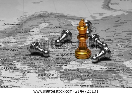 Ukraine and Russia Conflict. King and pawns on the map.