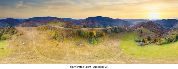 Ukraine. Sunrise shines in the Carpathians, colored fog spreads over the valleys and lowlands of the mountain range, golden prairies are very dazzlingly beautiful. - Shutterstock ID 2156888437