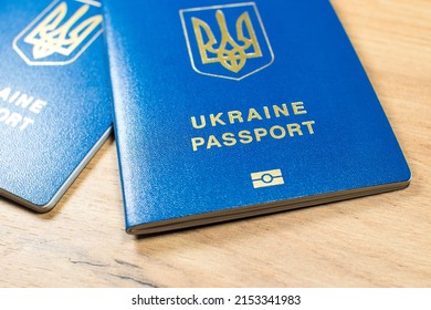 Ukrainian biometric passport id to travel the Europe without visas on the table. Inscription in Ukrainian 