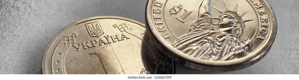 Ukrainian Coin Of 1 Hryvnia And US Coin Of One Dollar Closeup. Faded Almost Black And White Banner About Economy And Central Bank Of Ukraine. Light Money Headline. Macro