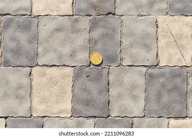 Ukrainian Coin On The Sidewalk. Money Is On The Ground.